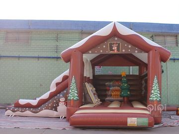 冬の間にスライドとコンボ クリスマスのInflatablesの装飾の跳ね上がりの家のスライド