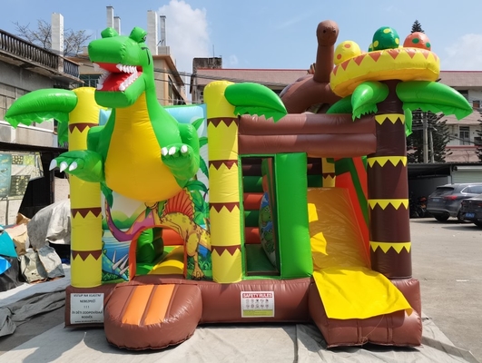 子供のためのスライドの恐竜の主題の跳ね上がりの家が付いている注文の膨脹可能な弾力がある城