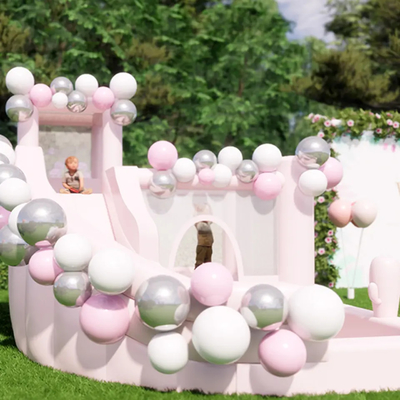 ピンクの膨脹可能な警備員の幼児の跳躍の城の跳ね上がりの家のコマーシャル