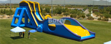 青い乾燥した、ぬれたスライド、遊園地のための二重車線が付いている膨脹可能なドロップ キックのスライド