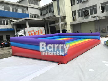 虹の運動場のための膨脹可能な跳躍のベッドの膨脹可能な警備員のおかしい屋外の膨脹可能なスポーツのゲーム
