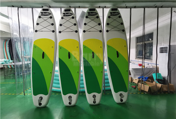 カスタマイズされた緑および黄色の膨脹可能な一口板はPaddleboardを立てる